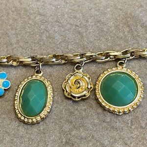 Gold tone charm bracelet